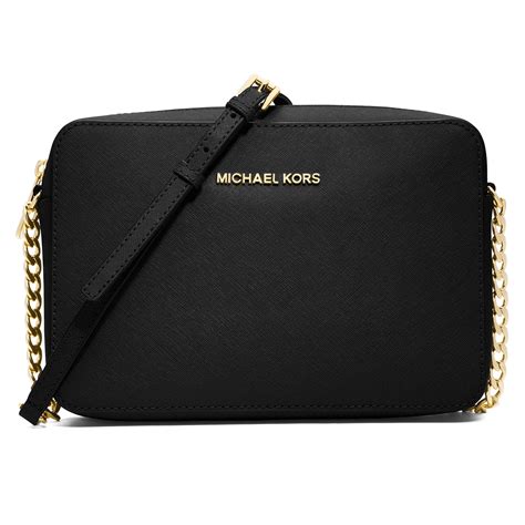 black michael kors cosmetic bag|Michael Kors crossbody bag black.